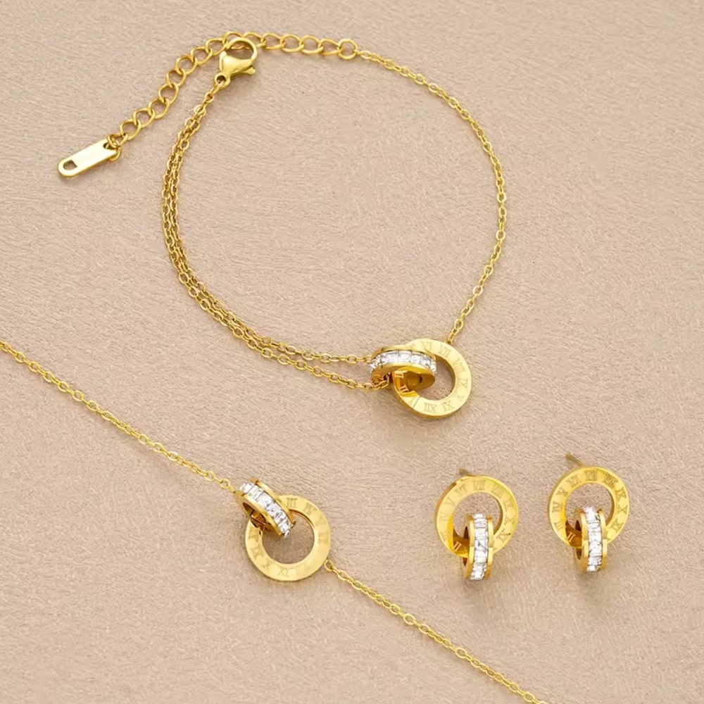 ✨ 18K Gold Plated Stainless Steel Roman Numeral Crystal Interlocking Jewelry Set